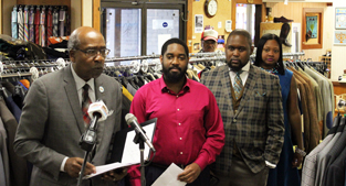 Mayor speaks at Abe Koplen Clothing ceremony